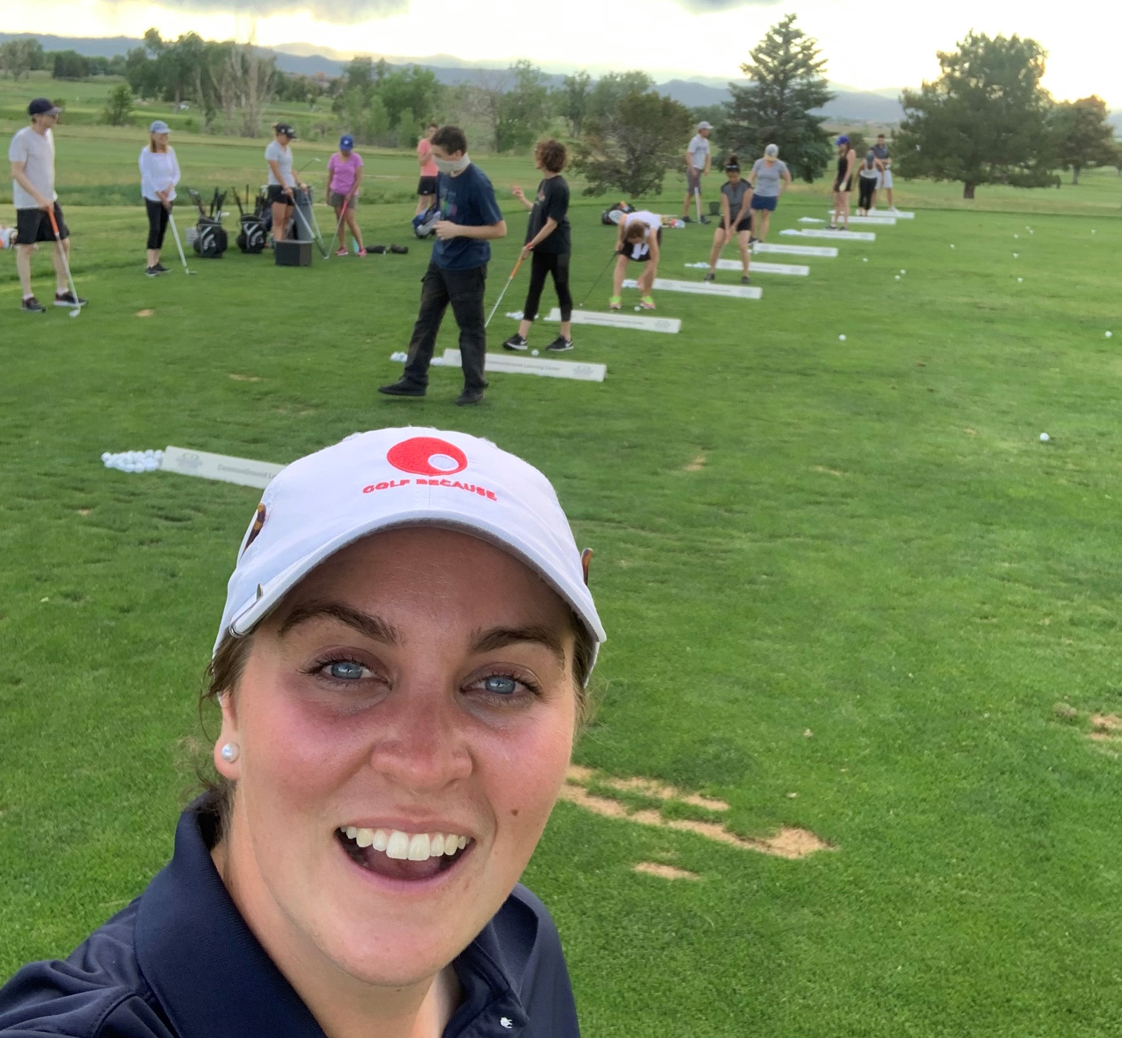 Image of teacher Maggie Hartman, PGA, working with participants at a Welcome2Golf class at Commonground Golf Course in Colorado.